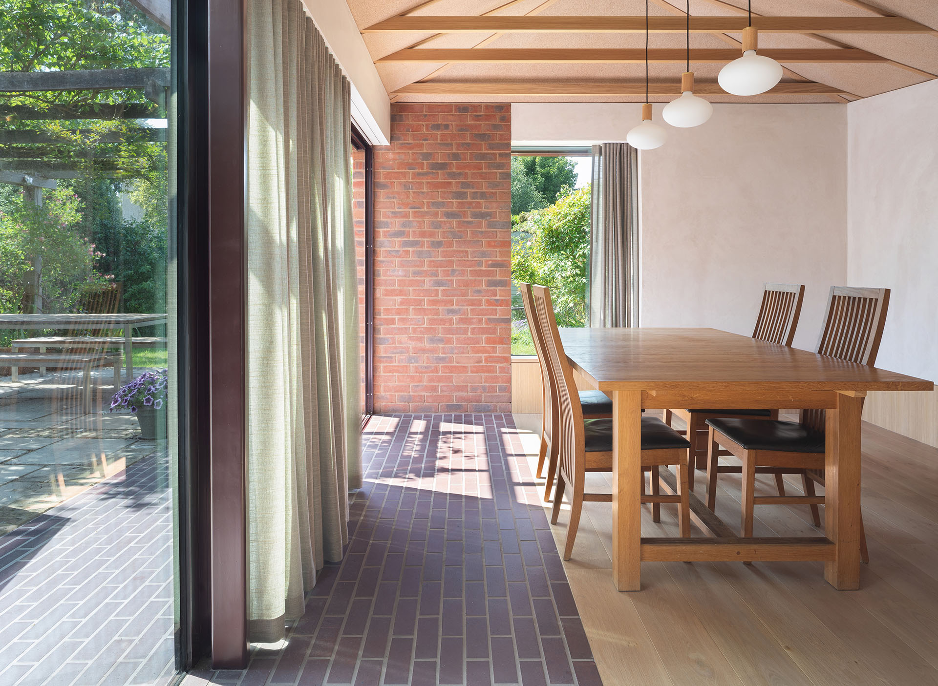 a renovation using brown brindle quarry tiles in Barnes by Polescuk Architects is Sustainable at Heart Agnese Sanvito
